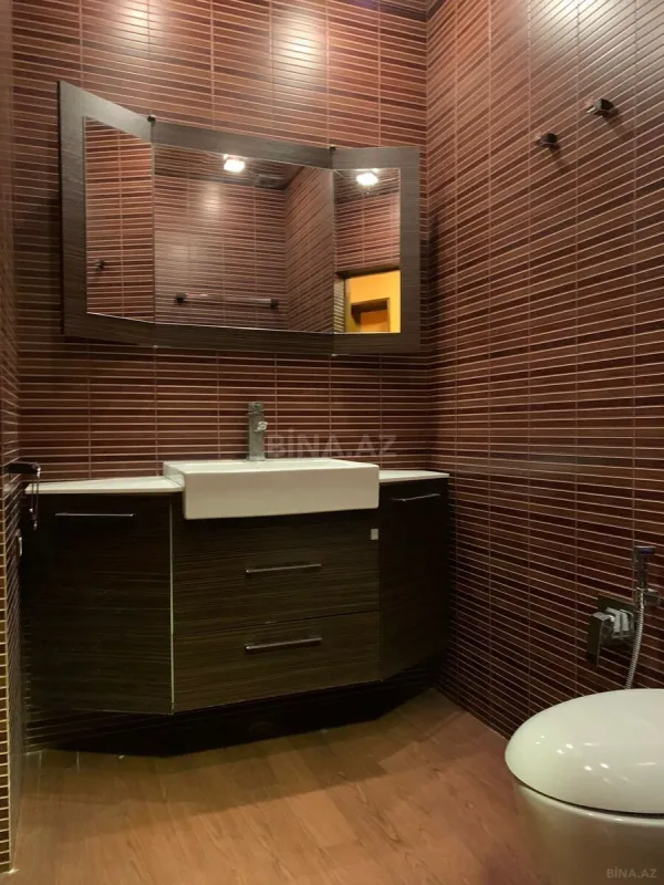 Satılır 4 otaqlı mənzil 115 m²