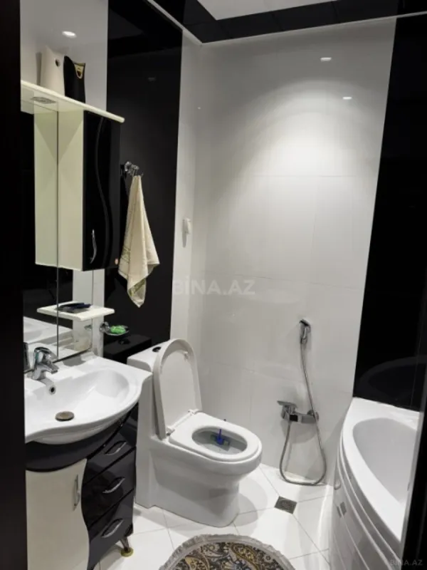 Satılır 4 otaqlı mənzil 165 m²