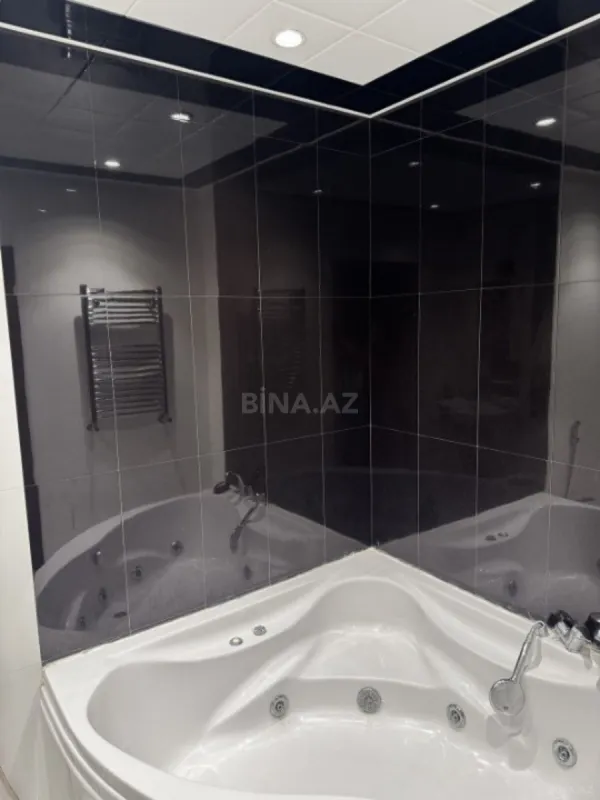 Satılır 4 otaqlı mənzil 165 m²