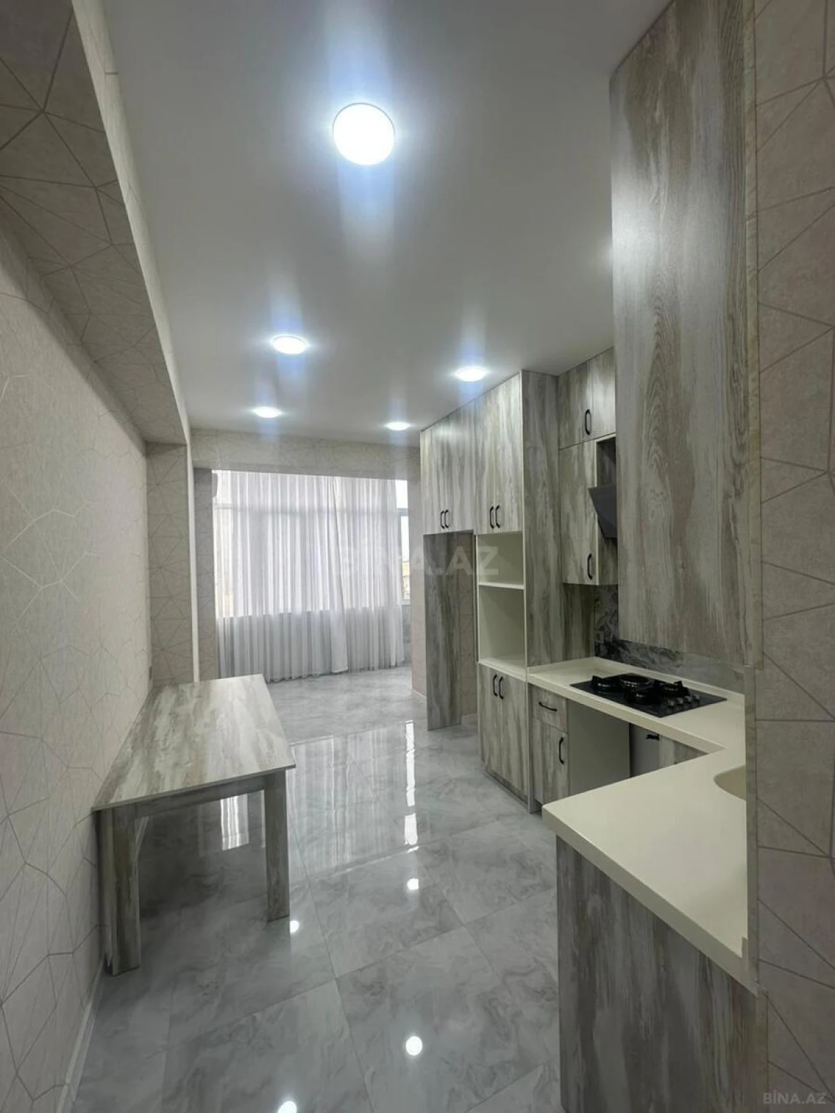 Satılır 4 otaqlı mənzil 109 m²
