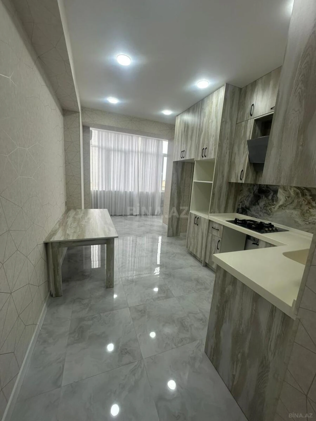 Satılır 4 otaqlı mənzil 109 m²