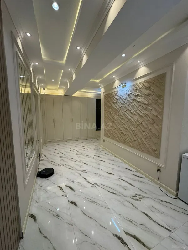 Satılır 4 otaqlı mənzil 128 m²