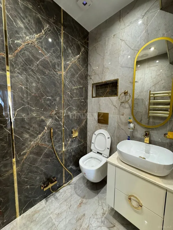 Satılır 4 otaqlı mənzil 128 m²