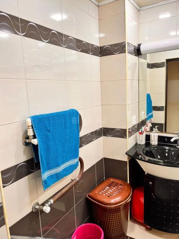 Satılır 4 otaqlı mənzil 127 m²