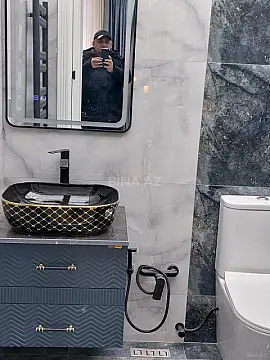 Satılır 4 otaqlı mənzil 141 m²