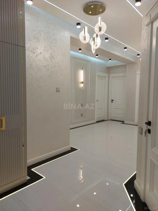 Satılır 4 otaqlı mənzil 141 m²