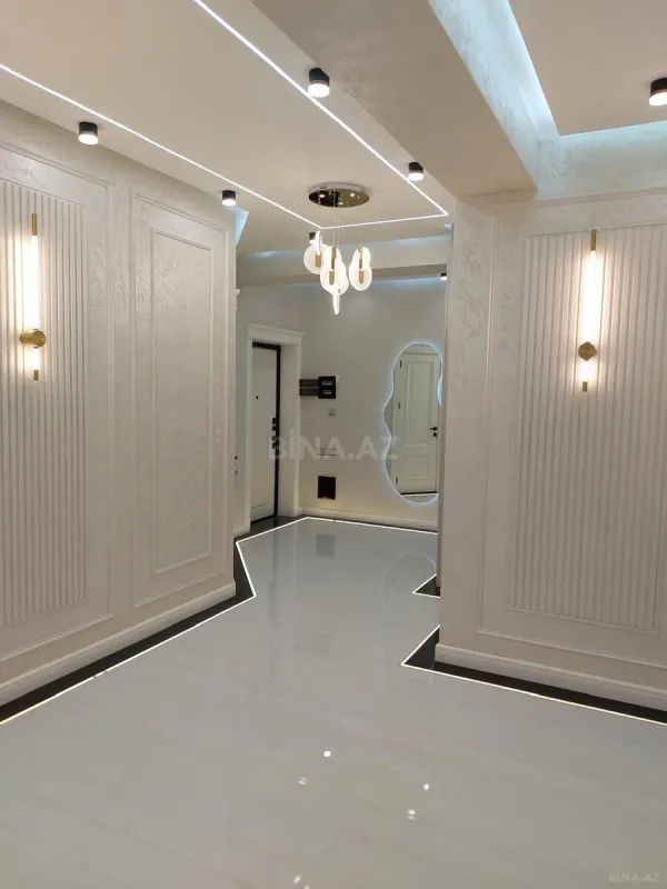 Satılır 4 otaqlı mənzil 141 m²