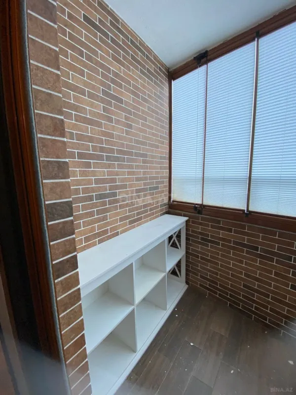 Satılır 4 otaqlı mənzil 123.7 m²