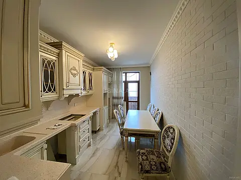 Satılır 4 otaqlı mənzil 123.7 m²