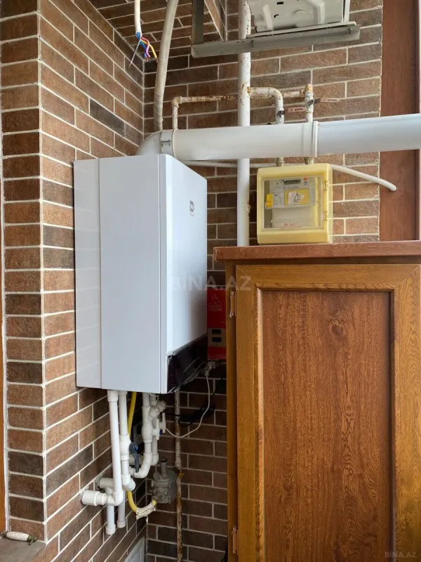 Satılır 4 otaqlı mənzil 123.7 m²