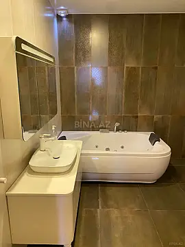 Satılır 4 otaqlı mənzil 123.7 m²