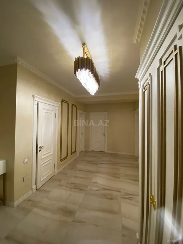 Satılır 4 otaqlı mənzil 123.7 m²