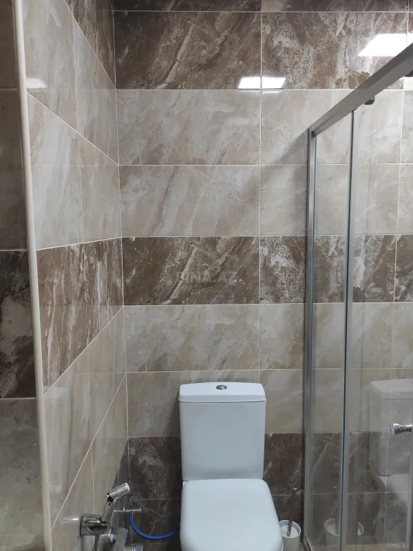 Satılır 2 otaqlı mənzil 64 m²