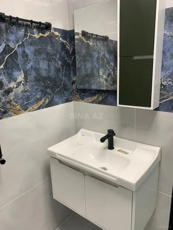 Satılır 2 otaqlı mənzil 55 m²