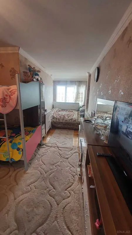 Satılır 4 otaqlı mənzil 124 m²