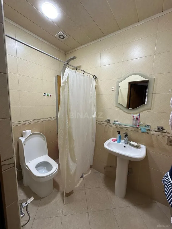 Satılır 4 otaqlı mənzil 140 m²