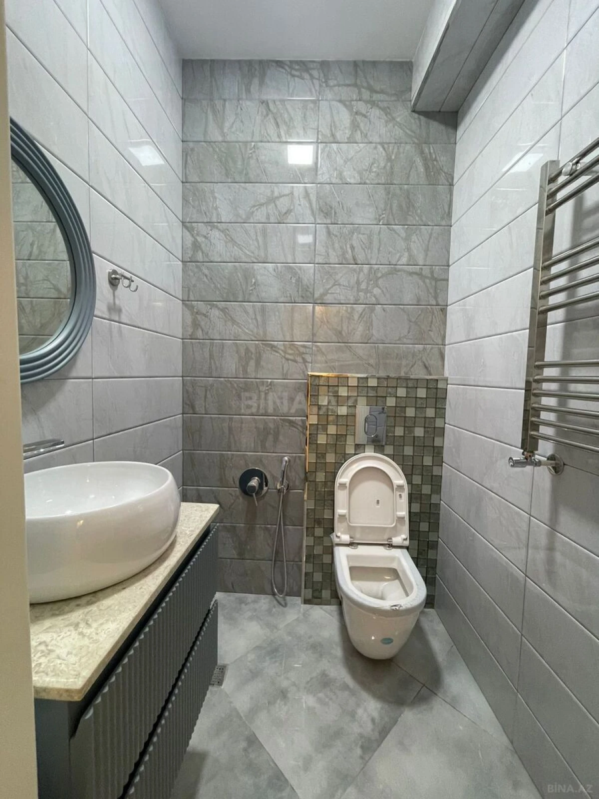 Satılır 4 otaqlı mənzil 136 m²