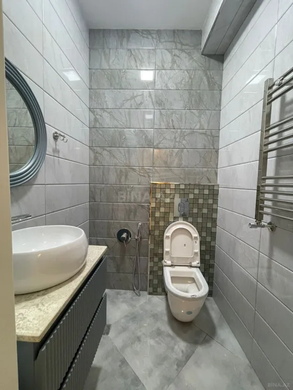 Satılır 4 otaqlı mənzil 136 m²