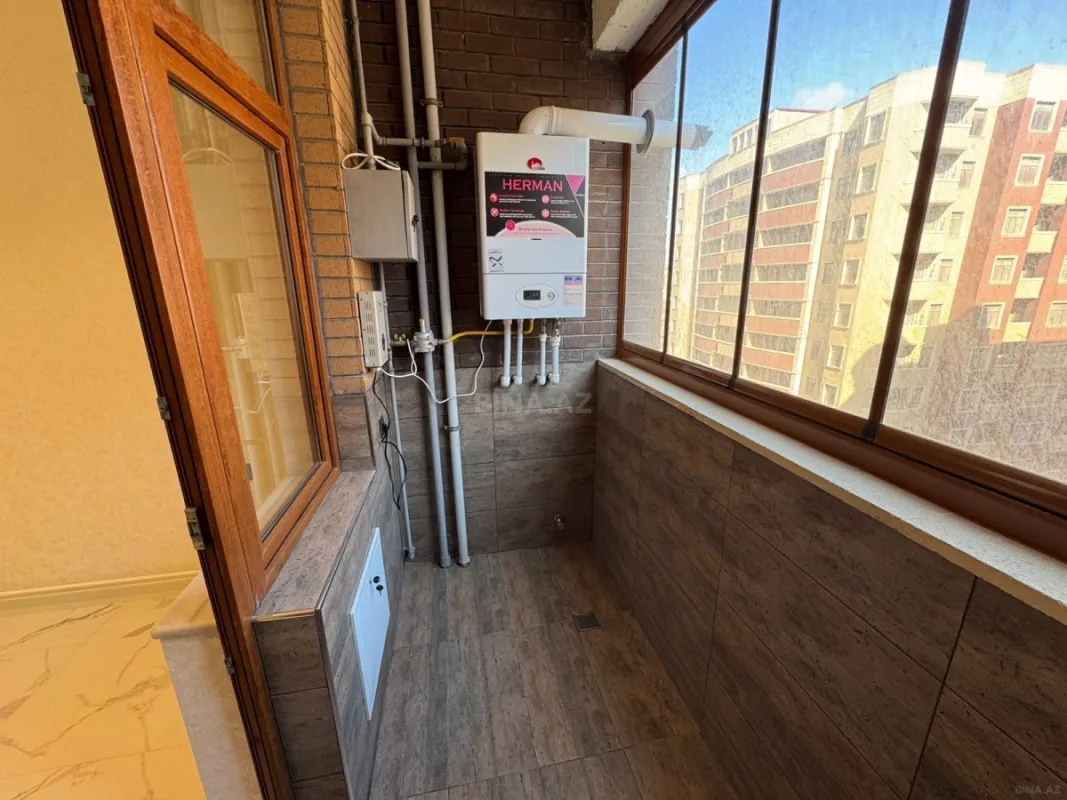 Satılır 3 otaqlı mənzil 107.6 m²