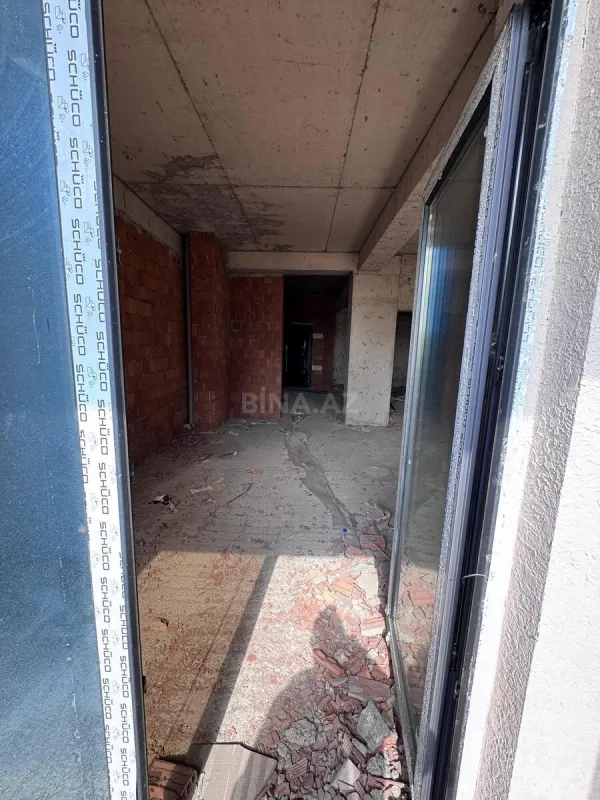 Satılır 4 otaqlı mənzil 143 m²