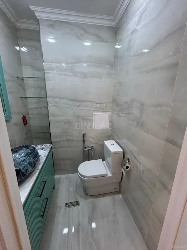 Satılır 3 otaqlı mənzil 136 m²