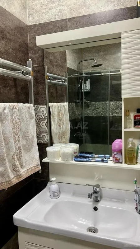 Satılır 2 otaqlı mənzil 60.7 m²