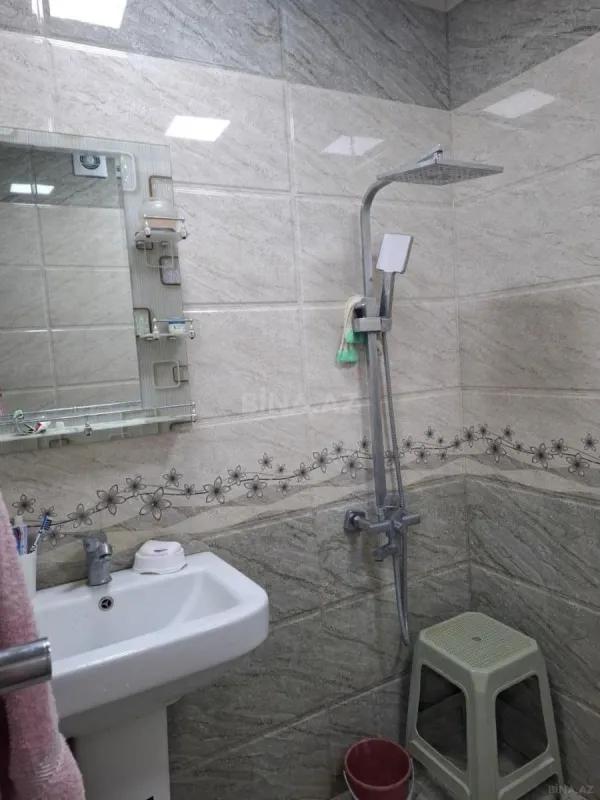 Satılır 5 otaqlı mənzil 112 m²