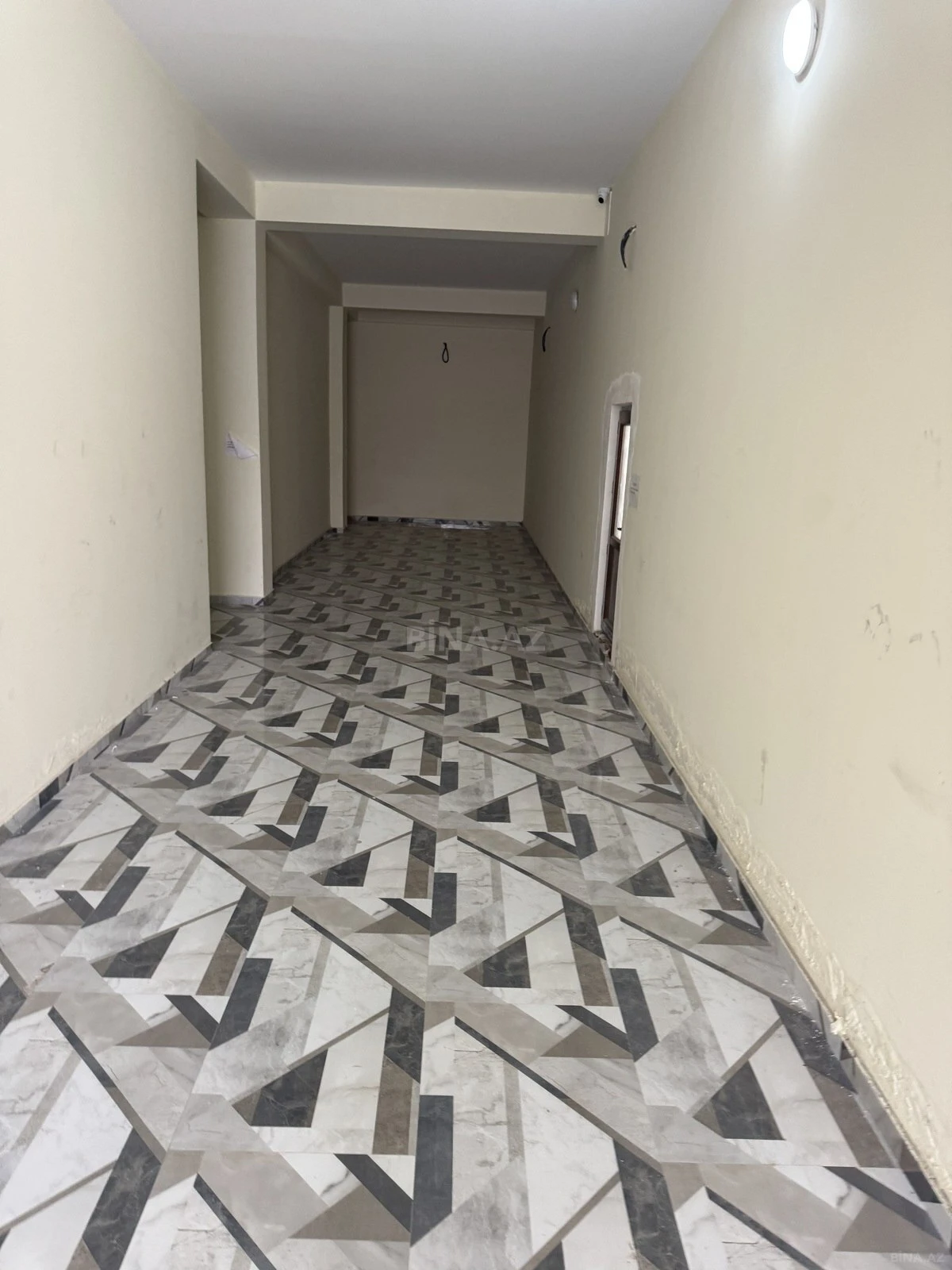 Satılır 1 otaqlı mənzil 76.4 m²