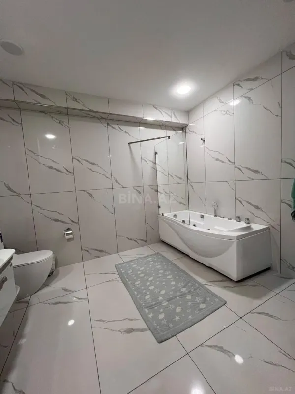 Satılır 4 otaqlı mənzil 195 m²