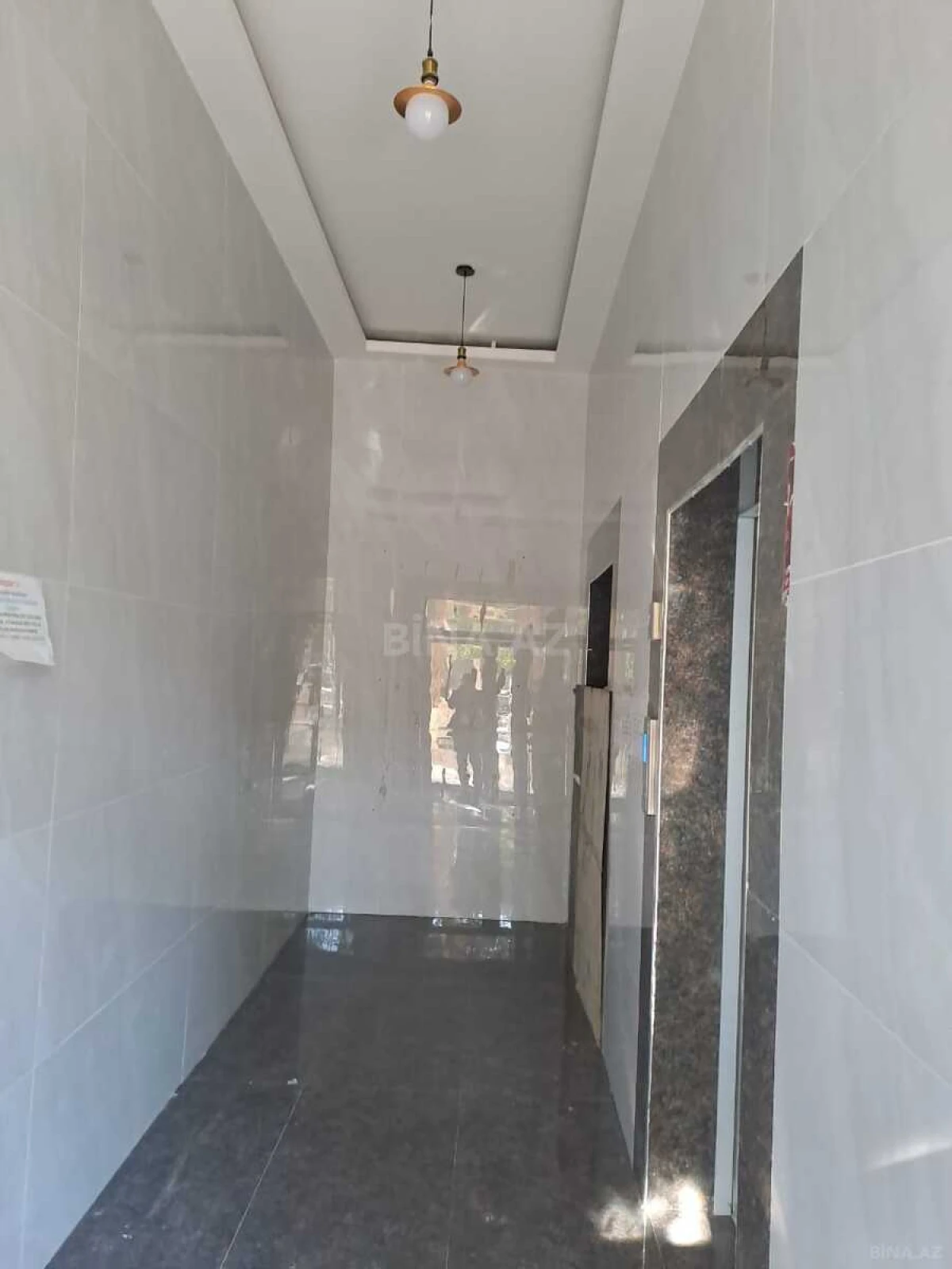 Satılır 4 otaqlı mənzil 131 m²