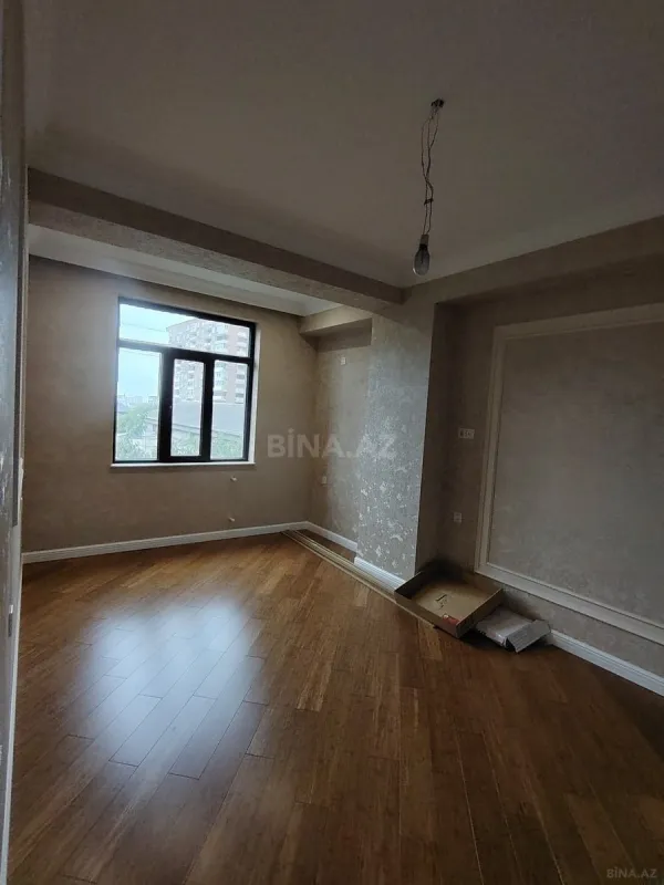 Satılır 4 otaqlı mənzil 143 m²