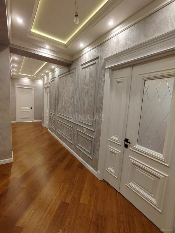 Satılır 4 otaqlı mənzil 143 m²