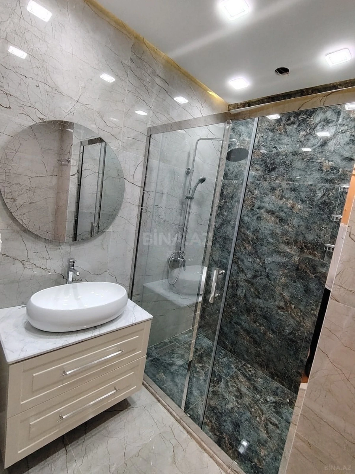 Satılır 4 otaqlı mənzil 143 m²