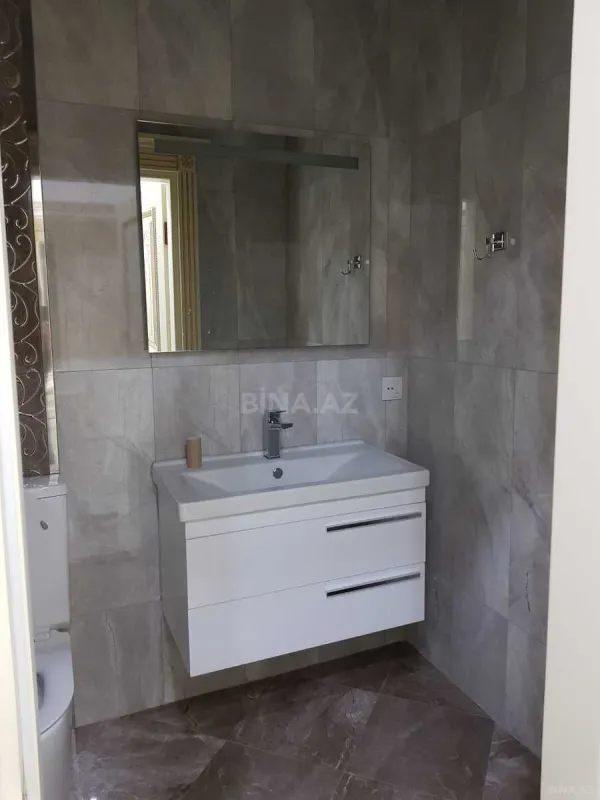 Satılır 3 otaqlı mənzil 148 m²