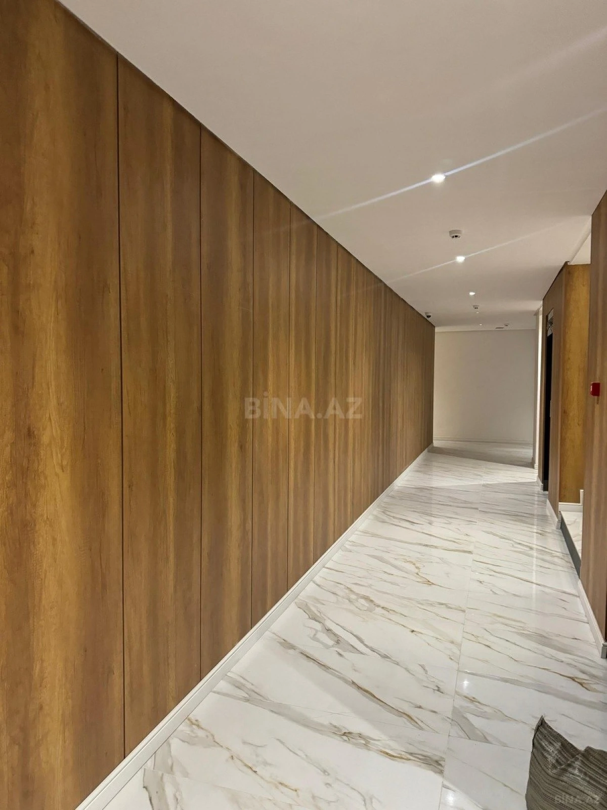 Satılır 3 otaqlı mənzil 133.4 m²