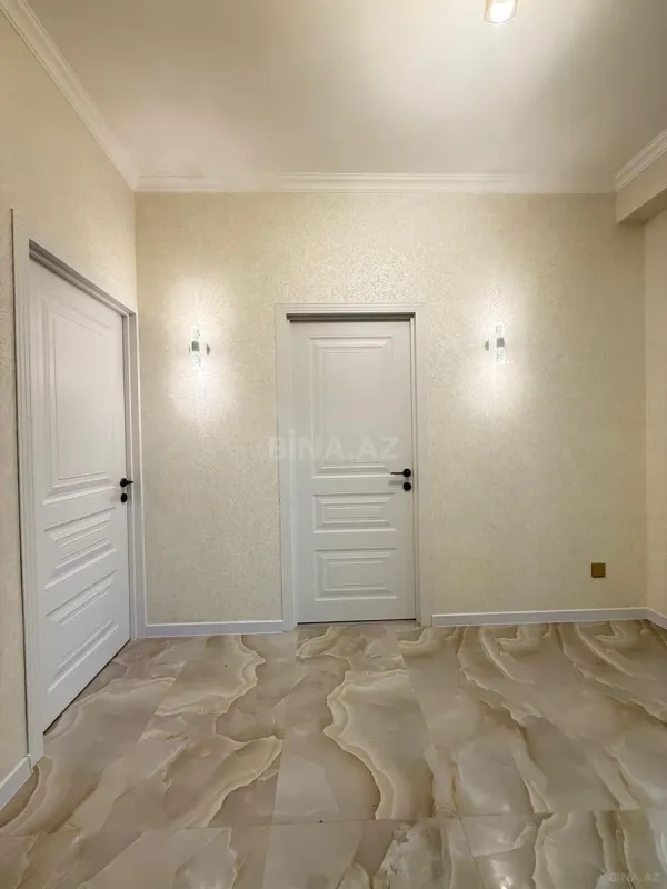 Satılır 2 otaqlı mənzil 76 m²