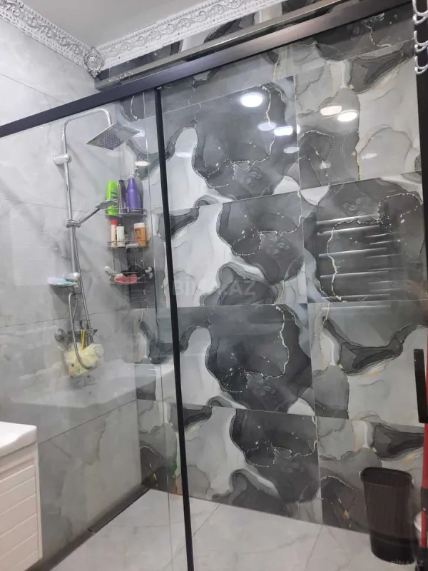 Satılır 4 otaqlı mənzil 140 m²