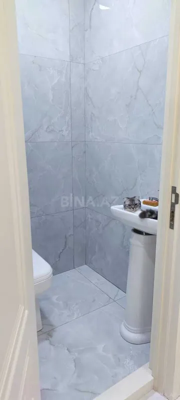 Satılır 4 otaqlı mənzil 140 m²