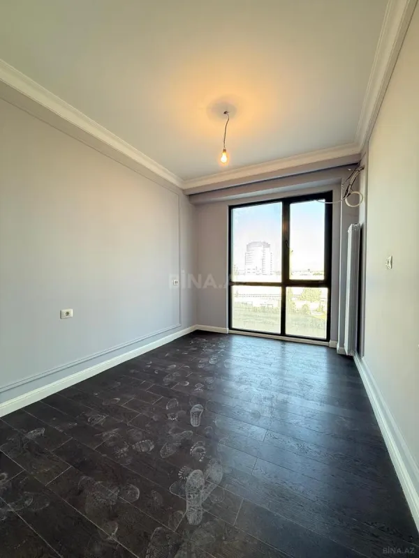 Satılır 4 otaqlı mənzil 128 m²