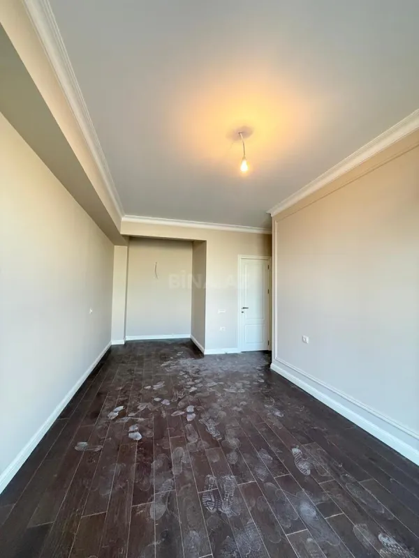 Satılır 4 otaqlı mənzil 128 m²