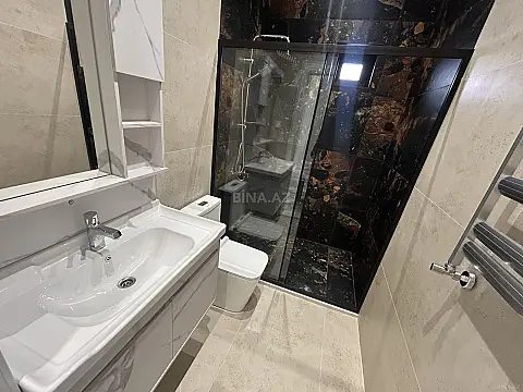 Satılır 4 otaqlı mənzil 135 m²
