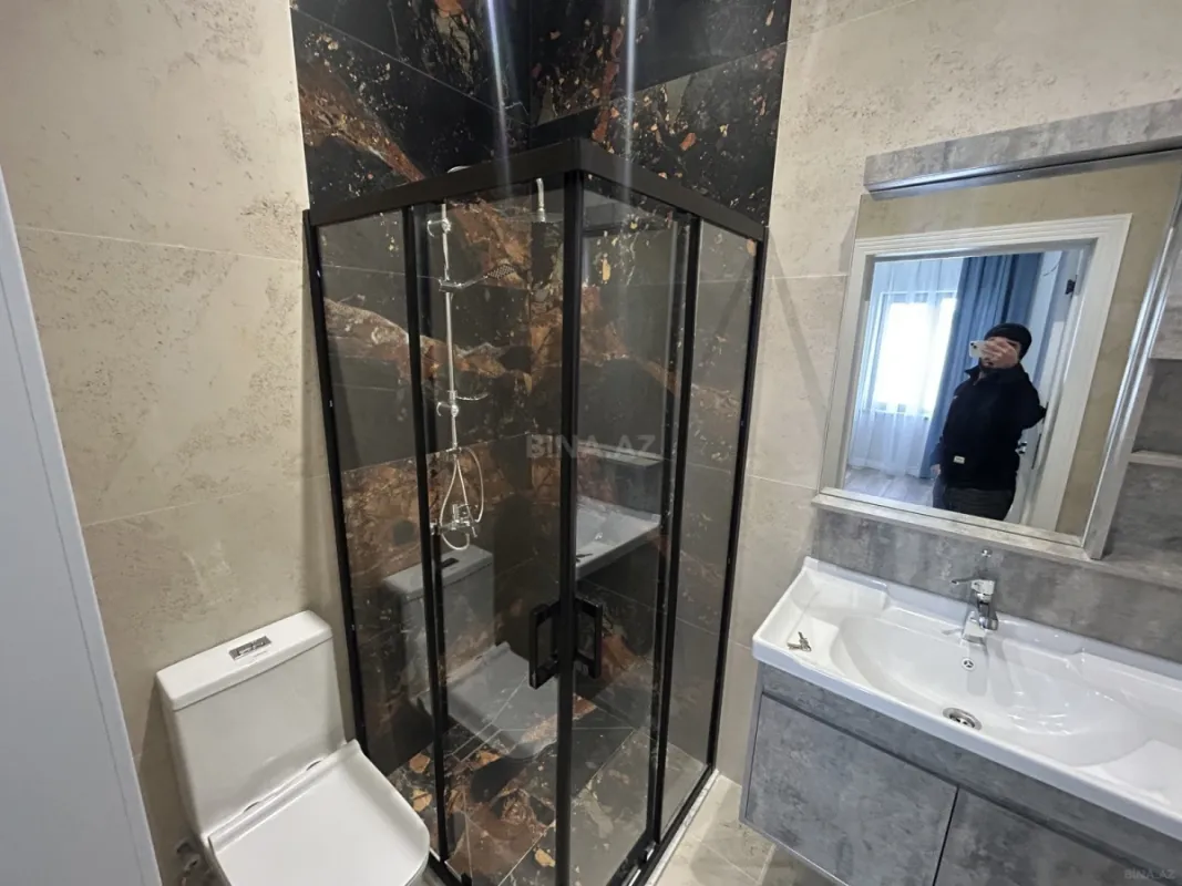 Satılır 4 otaqlı mənzil 135 m²