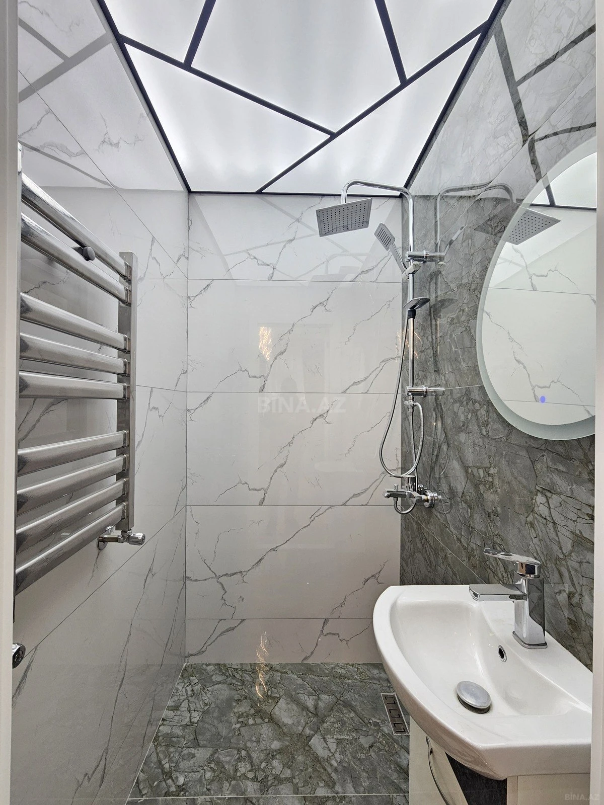 Satılır 4 otaqlı mənzil 134 m²