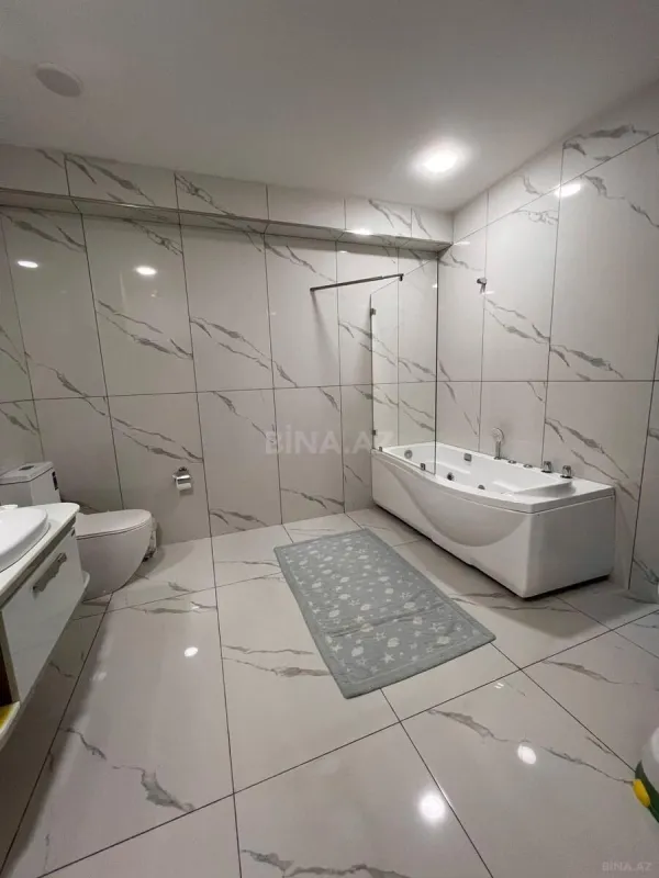 Satılır 4 otaqlı mənzil 195 m²