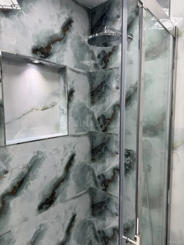 Satılır 3 otaqlı mənzil 145 m²