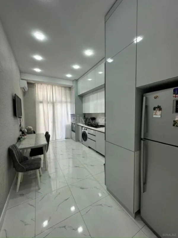 Satılır 4 otaqlı mənzil 127 m²