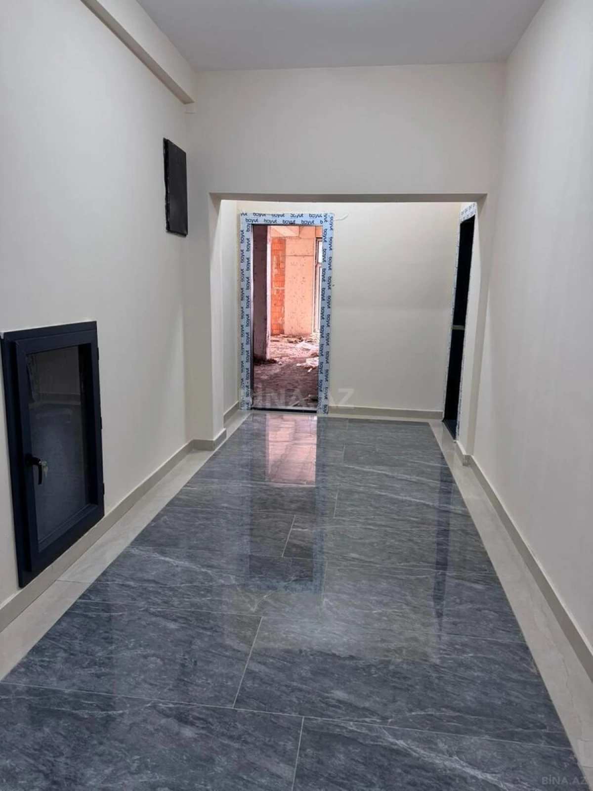 Satılır 4 otaqlı mənzil 143 m²