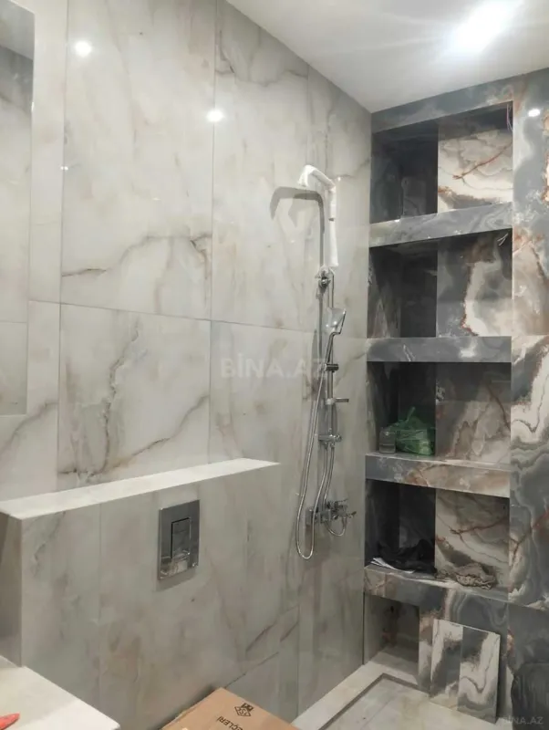 Satılır 4 otaqlı mənzil 148 m²