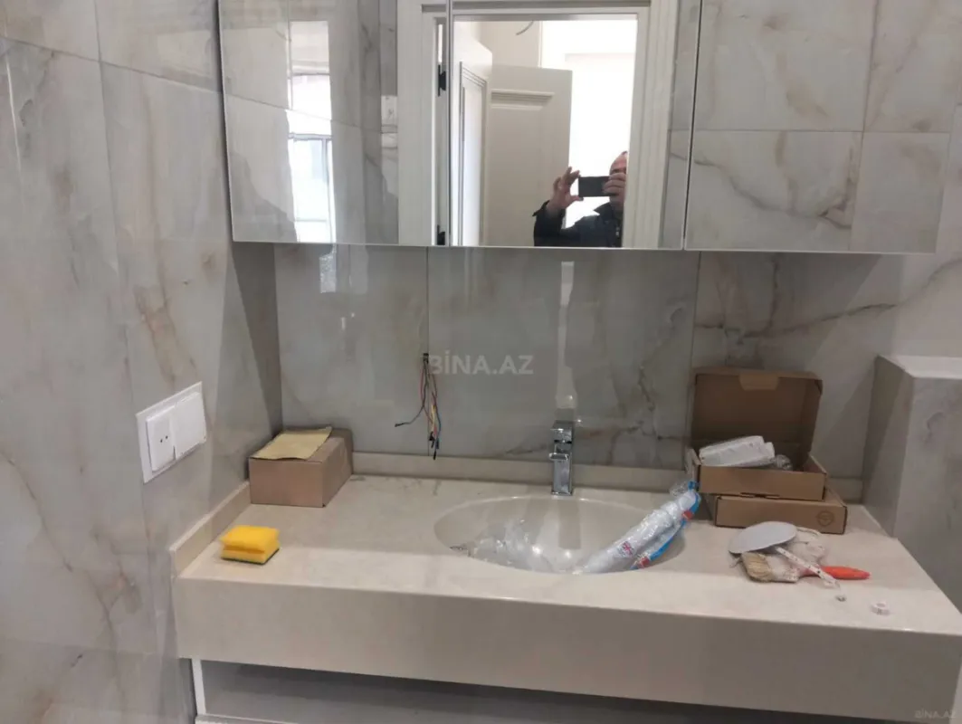 Satılır 4 otaqlı mənzil 148 m²