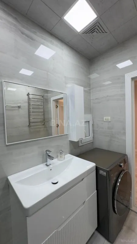 Satılır 4 otaqlı mənzil 145 m²
